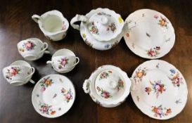 Seventeen pieces of hand painted 19thC. floral tea