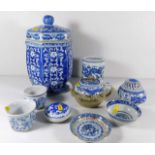 A Chinese blue & white brush pot twinned with eigh