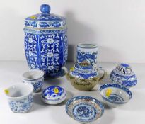 A Chinese blue & white brush pot twinned with eigh