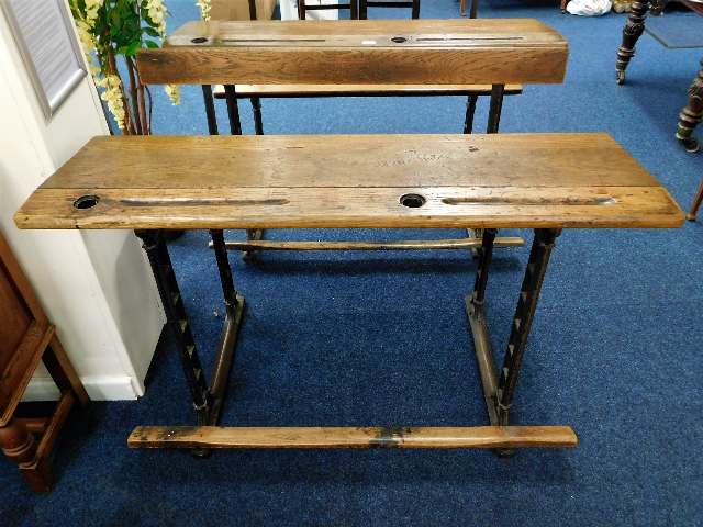 A twin Victorian cast iron & oak school desk 48in