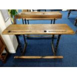 A twin Victorian cast iron & oak school desk 48in