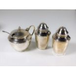 A silver condiment set Birmingham 1978 by A. T. Ca