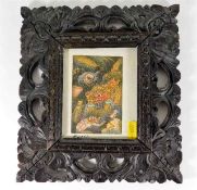 A framed Asian watercolour set within carved organ