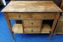 A c.1900 oak arts & crafts style sideboard with fo