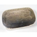 A 19thC. white metal snuff box with chased decor 5