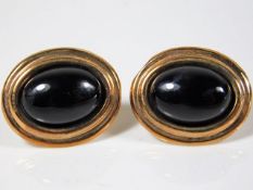 A pair of 9ct gold earrings set with onyx 3.1g