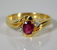 A 14ct gold ring set with diamond & ruby 2.7g size