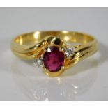 A 14ct gold ring set with diamond & ruby 2.7g size