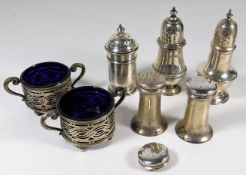 Five silver pepper pots & a glass lined silver sal