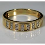 A 9ct gold ring set with 0.25ct diamonds 2.9g size