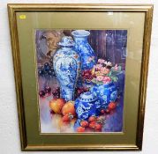 A gilt framed still life watercolour depicting fru