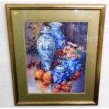 A gilt framed still life watercolour depicting fru