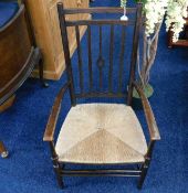 An Ernest Gimson style low level chair