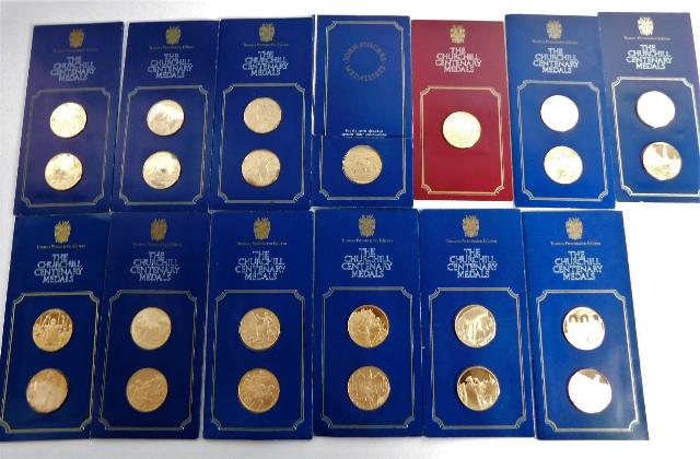 Twenty four silver gilt commemorative Churchill Ce