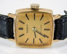 A ladies Tissot wristwatch with 9ct gold case