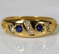 An 18ct diamond & sapphire ring 4.2g size N/O