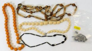 A vintage amber style necklace 45g, a jet necklace