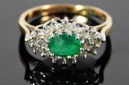 An 18ct gold ring set with emerald & approx. 0.25c