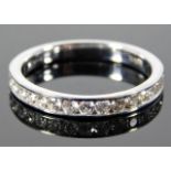 A 9ct white gold half eternity ring set with appro