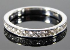 A 9ct white gold half eternity ring set with appro