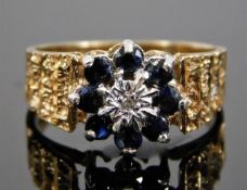 A 9ct gold ring set with diamonds & sapphire 3.5g