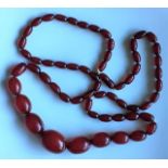 A vintage cherry amber style beaded necklace approx. 64g