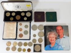 Four five pound crowns, a 1961 coin set, two 1951