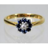18ct gold daisy style ring set with diamond & sapp