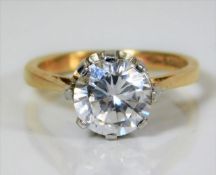 A 9ct gold ring with Tiffany style mount & paste s