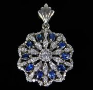 An 18ct white gold pendant set with sapphire & app