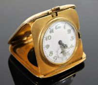 A 9ct gold Huguenin Freres folding pocket clock 58
