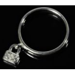 A 9ct white gold ring with small padlock set with