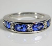 An 18ct white gold tanzanite & diamond ring 6.4g s