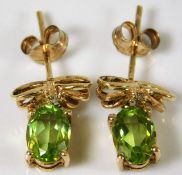 A pair of 9ct gold peridot & diamond earrings 2.3g