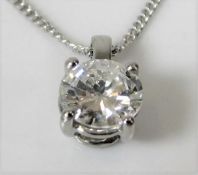 A platinum necklace & pendant set with approx. 0.8