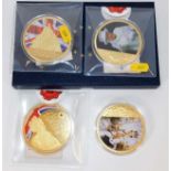 Four large commemorative gold plated proof medals