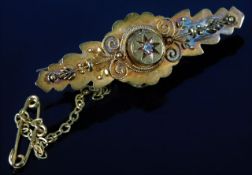 An antique 15ct gold memorial brooch set with diam