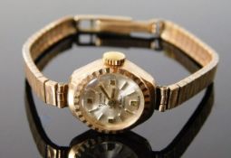 A 9ct gold strap & case ladies Delvina wristwatch