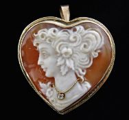 A 9ct gold cameo brooch/pendant set with gold diam