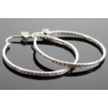 A pair 18ct white gold hoop earrings set with appr