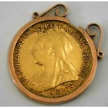 An 1895 Victorian half gold sovereign with mount 5