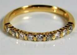 An 18ct gold half eternity ring set with approx. 0