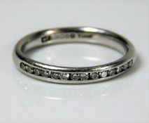 A platinum half eternity ring set with approx. 0.1