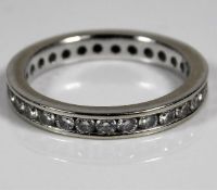 An 18ct white gold eternity ring set with approx.