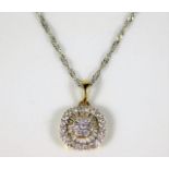 A platinum chain with 18ct two colour gold pendant