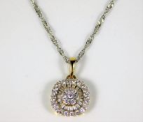 A platinum chain with 18ct two colour gold pendant