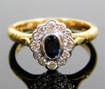 An 18ct gold ring set with sapphire & approx. 0.33