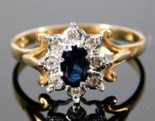 A 9ct gold ring set with approx. 0.16ct diamond & sapphire 2.2g size Q/R