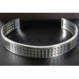 An 18ct white gold Gucci bangle with box & sleeve