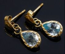 A pair of 9ct gold earrings set with topaz